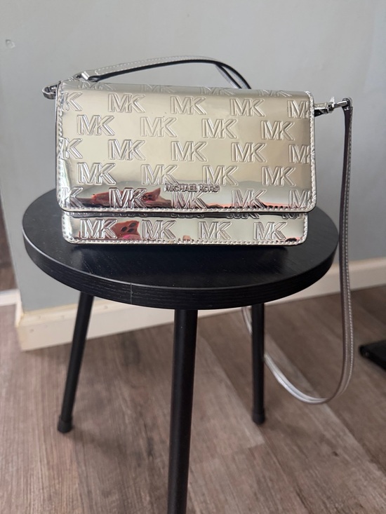 Michael Kors Handbags - Michael Kors Silver Embossed MK Logo Crossbody